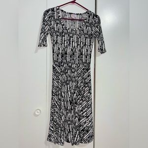 LuLaRoe Dress! Perfect for any occasion! Pair it with a cardigan or a belt.